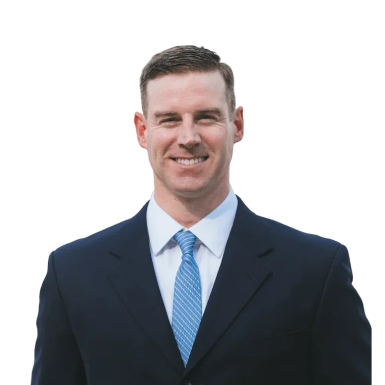 Attorney in a suit, smiling to the camera