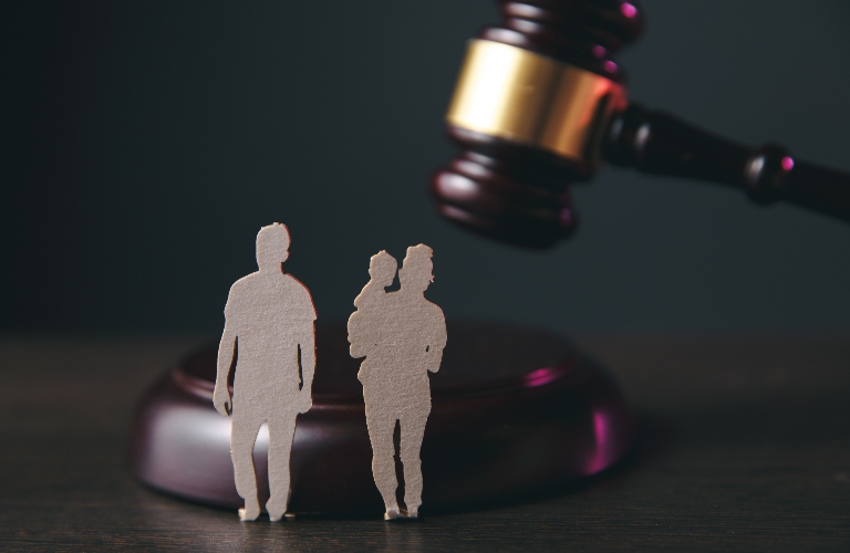 Family figure and judge's gavel
