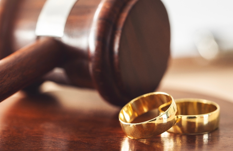 Wedding rings and judge's gavel