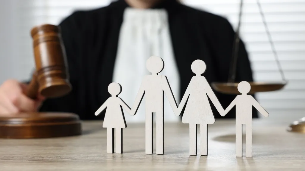 Judge and wooden family figures