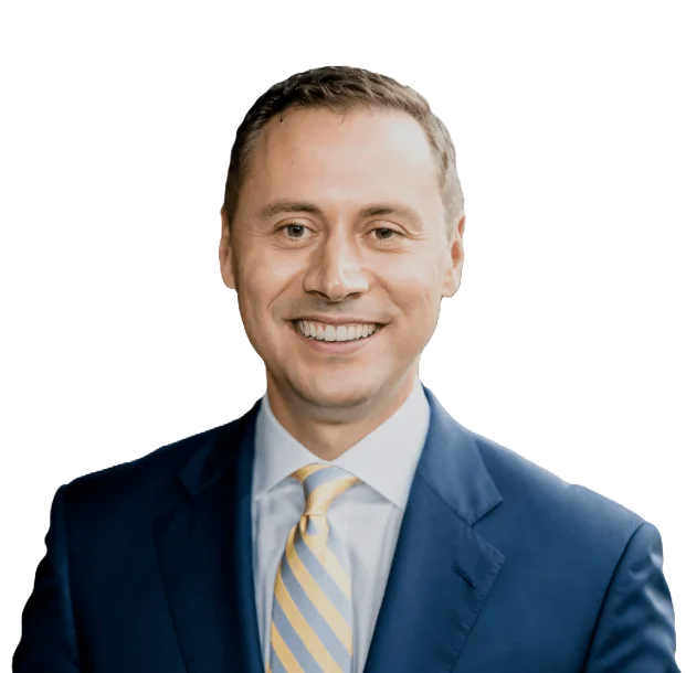 Attorney in a suit, smiling to the camera