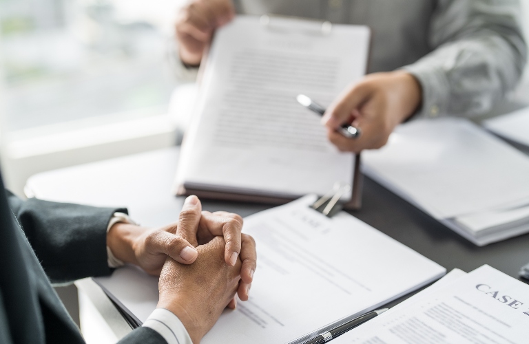 man is consulting with lawyer